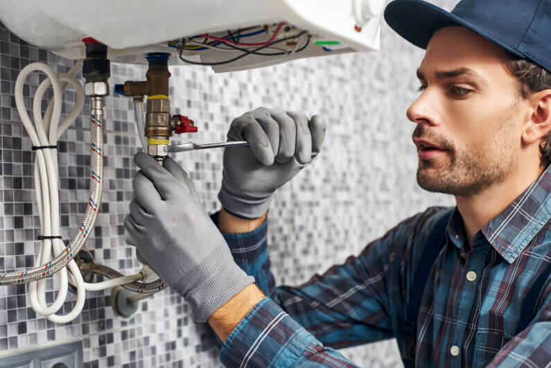 Plumbers are checking if the water heater is still working well